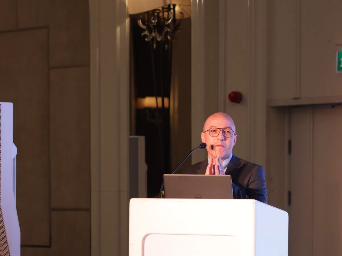 A speaker at the podium during the award ceremony